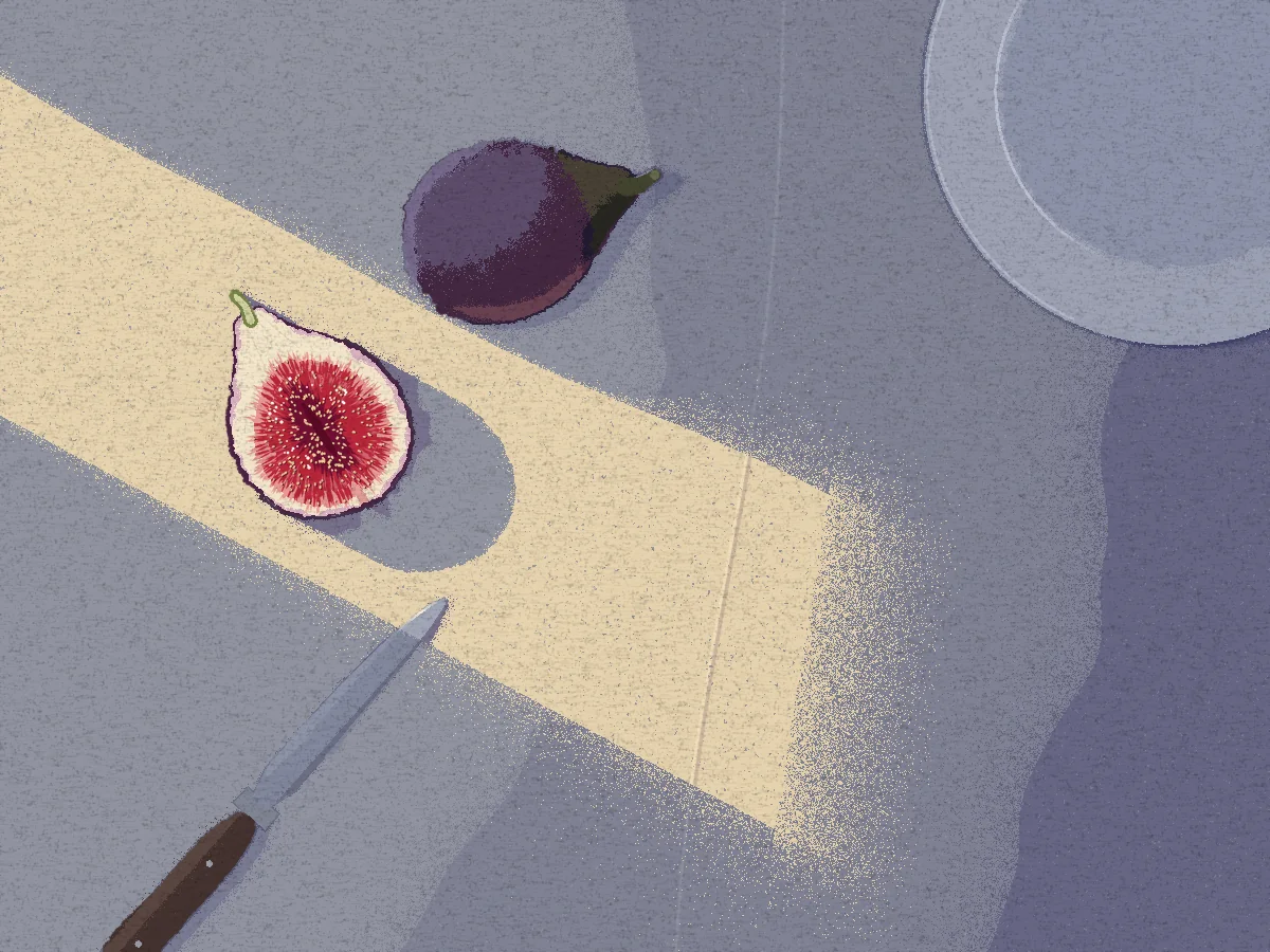 Top-down view of a grey-blue linen tablecloth crossed diagonally by a band of warm pale-yellow morning light. Inside the band lies half a cut fig, its red flesh drawn as fine threads radiating to a seeded centre, with a rounded shadow cut out of the light beside it. A whole purple fig with a green stem lies just outside the band in the cool shade. A small knife with a dark wooden handle reaches in from the lower left, and the rim of a pale plate is cut off by the top right corner. At its far end the light dissolves into fine grain.